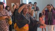 A woman dressed in a yukata, leading an obon dance