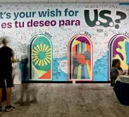people gathered at wish wall event