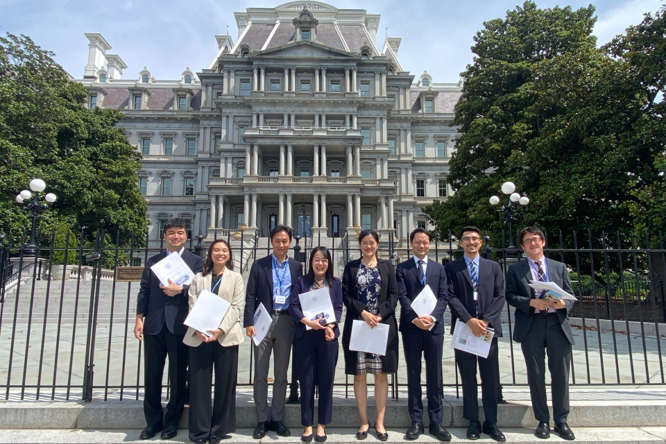 group of people in front of building